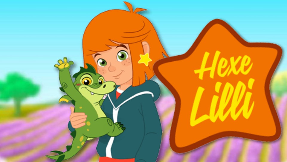 Hexe Lilli mit einem kleinen Drachen im Arm