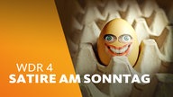 Ei in Karton mit breit grinsendem Gesicht