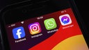 Auf einem iPhone sind verschiedene Apps von Meta zu sehen.