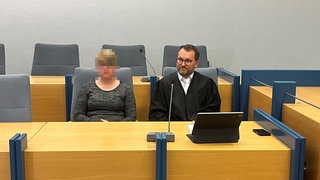 Angeklagte und Verteidiger